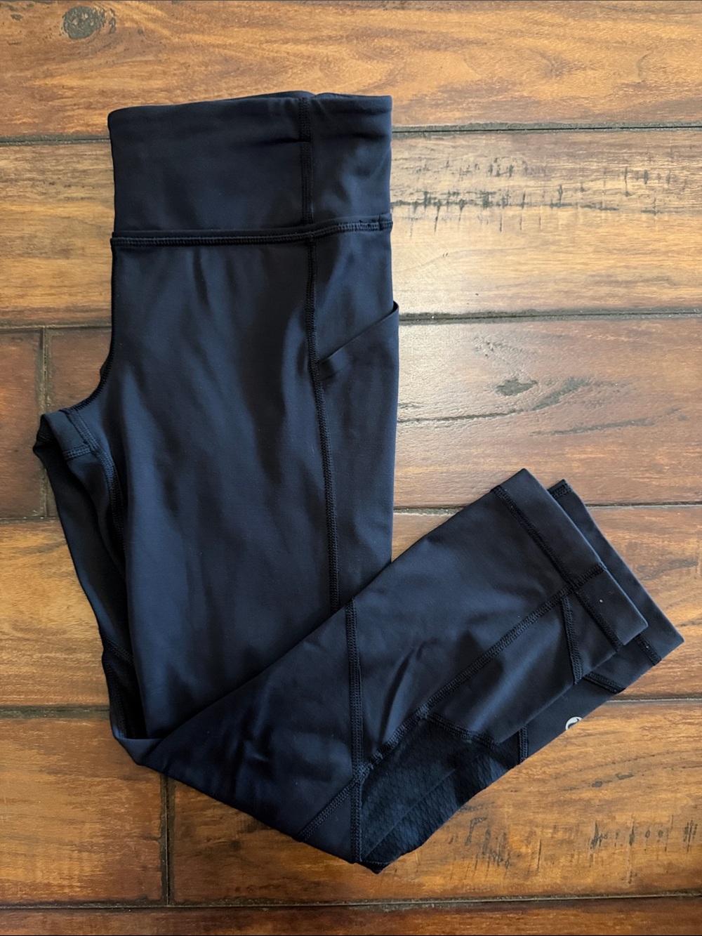 lululemon athletica Black Performance Cropped Leggings with Back Zip Pocket.